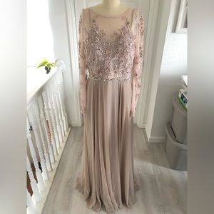 Long Sleeves beaded gown.